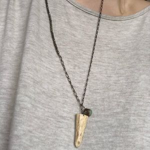 Chain and beaded necklace with bone horn charm